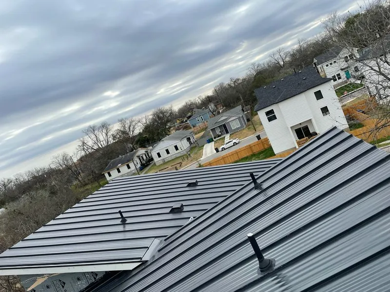Standing seam metal roof panels with vents for Skylight Repair in Ionia